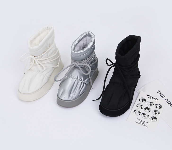 多蝴蝶结 羽绒服 靴子